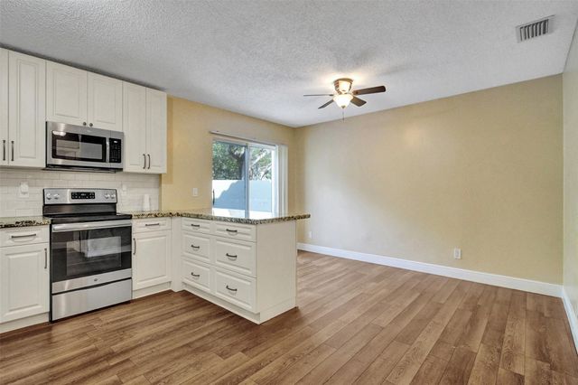 11567 N Open Ct, Cooper City, FL 33026