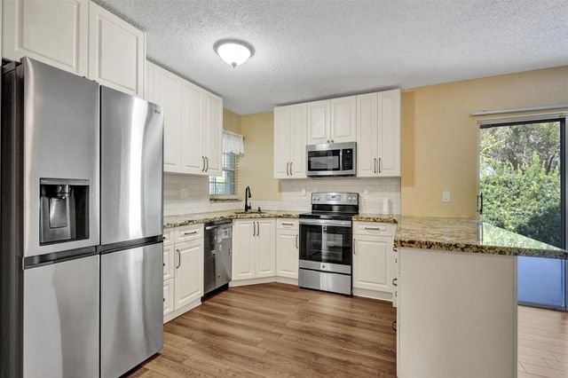 11567 N Open Ct, Cooper City, FL 33026