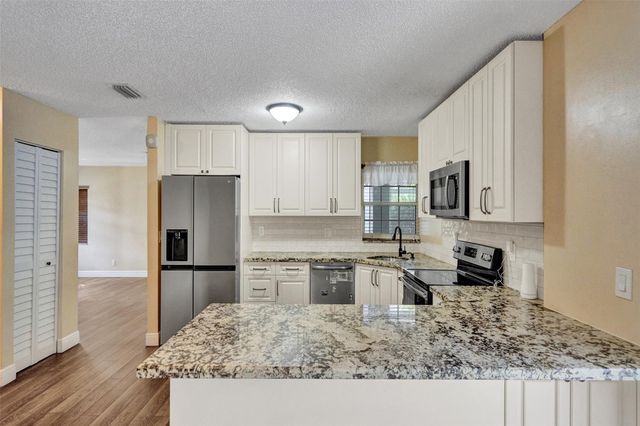 11567 N Open Ct, Cooper City, FL 33026