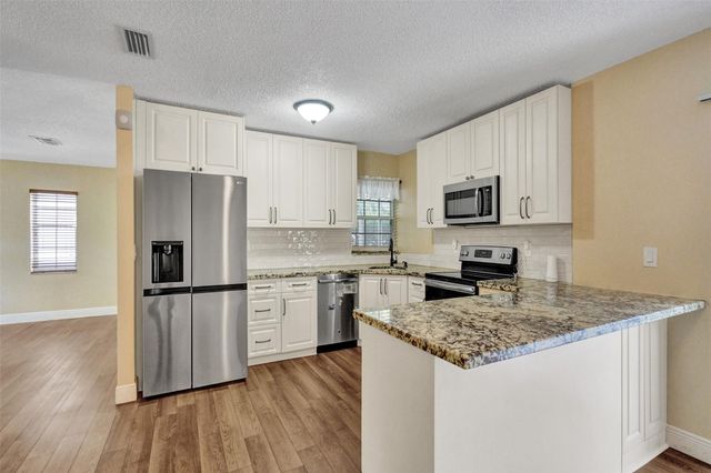 11567 N Open Ct, Cooper City, FL 33026