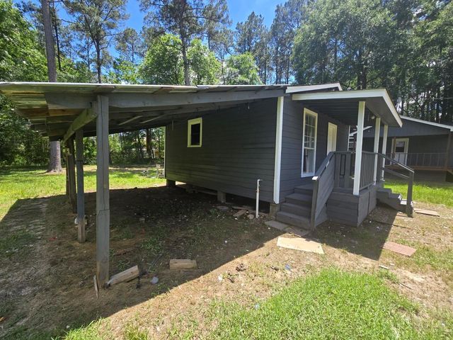 10858 Mill Creek Drive N, Plantersville, TX 77363