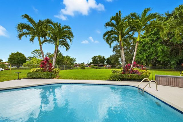 166 Alcazar Street, Royal Palm Beach, FL 33411