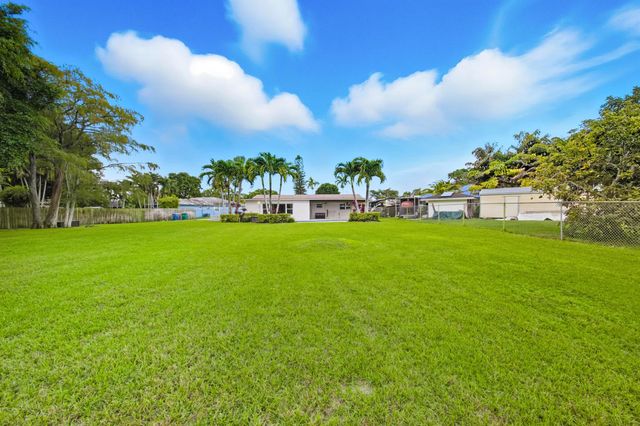 166 Alcazar Street, Royal Palm Beach, FL 33411