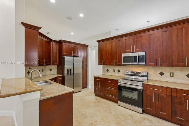 1290 Camellia Ln, Weston, FL 33326