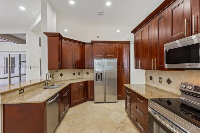 1290 Camellia Ln, Weston, FL 33326