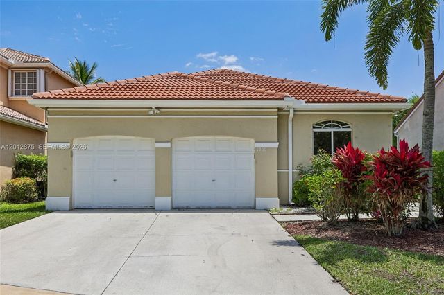 1290 Camellia Ln, Weston, FL 33326
