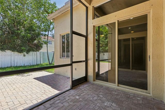 1290 Camellia Ln, Weston, FL 33326