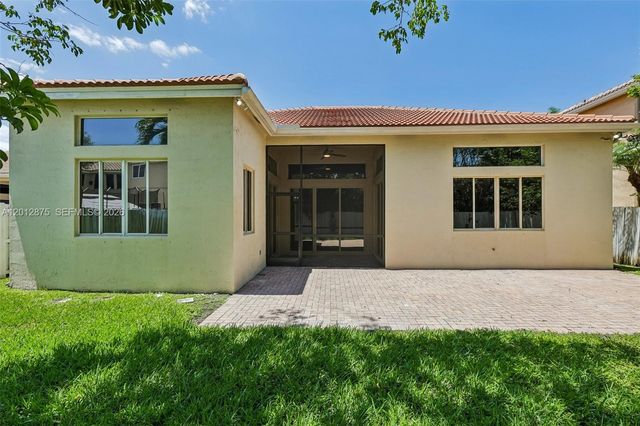 1290 Camellia Ln, Weston, FL 33326