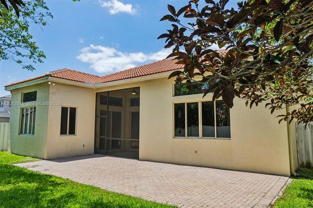 1290 Camellia Ln, Weston, FL 33326