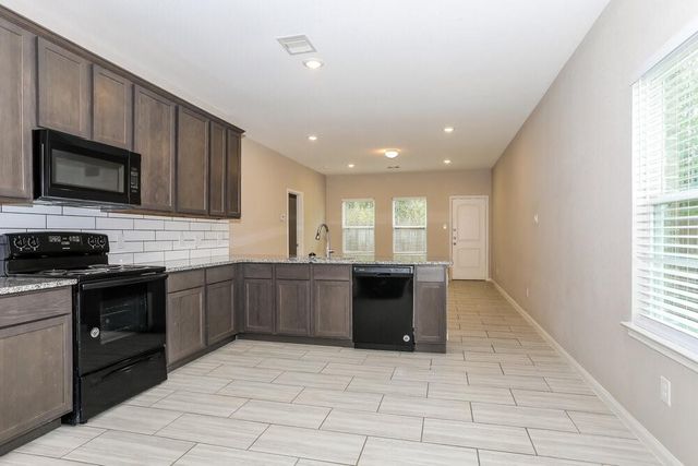 12469 Lake Conroe Hills Drive, Willis, TX 77318