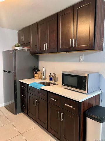 7703 58th Avenue, Middle Village, NY 11379