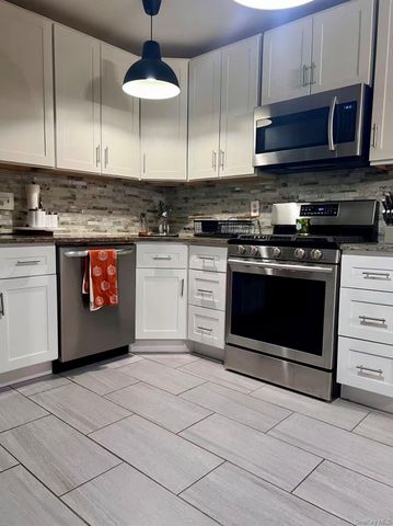 7703 58th Avenue, Middle Village, NY 11379