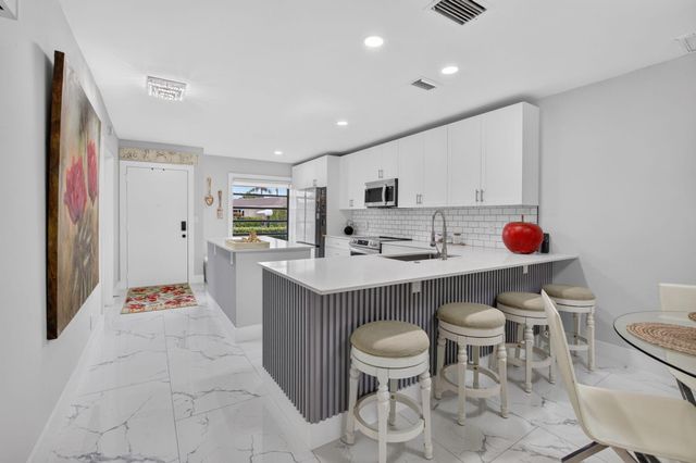 8967 Belle Aire Drive, Boca Raton, FL 33433