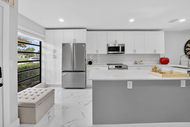 8967 Belle Aire Drive, Boca Raton, FL 33433