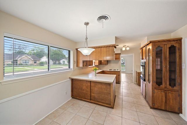 5002 Leafy Hollow Court, Houston, TX 77018