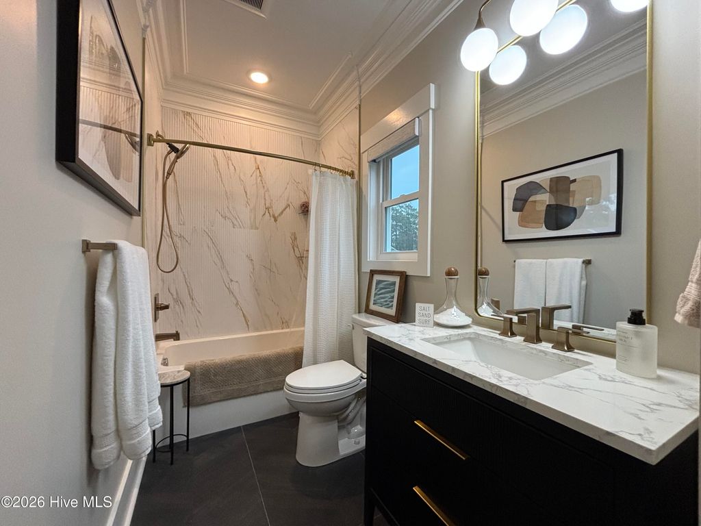 Image 100 of property listing at 315 NE 56th Street, Oak Island, NC 28465