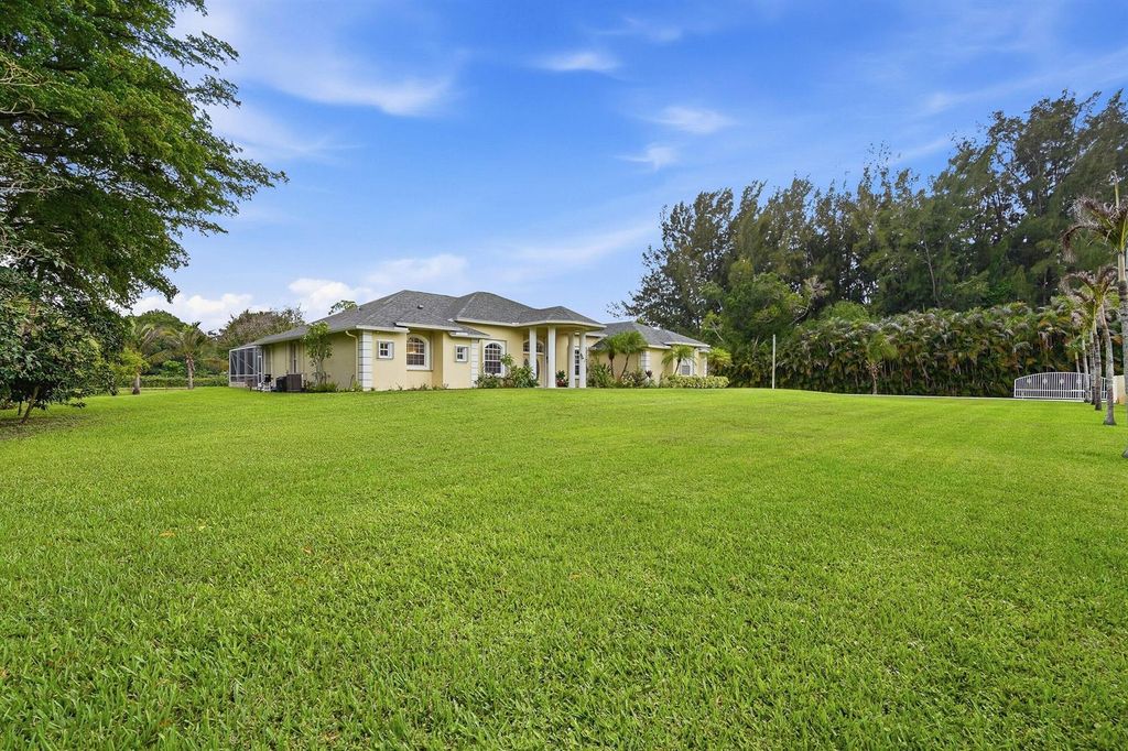 Image 7 of property listing at 13882 43rd Road N, Royal Palm Beach, FL 33411