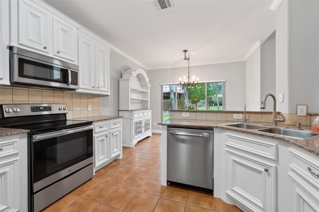 209 April Waters Drive W, Conroe, TX 77356