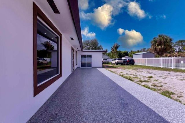 696 Arlington Drive, West Palm Beach, FL 33415