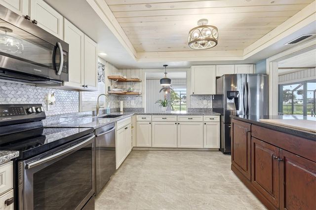 11 OAKLAND HILLS COURT, Rotonda West, FL 33947