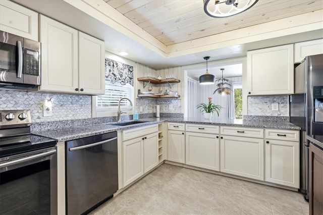 11 OAKLAND HILLS COURT, Rotonda West, FL 33947