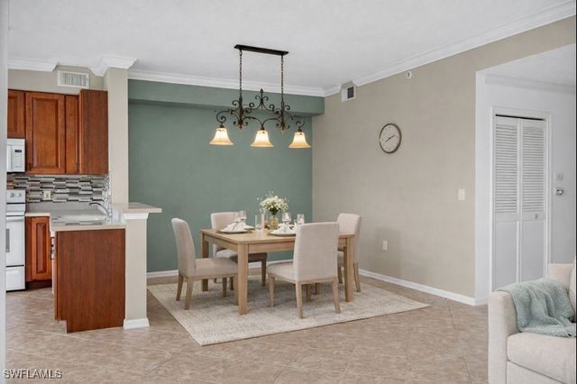 6816 STERLING GREENS PL 303, Naples, FL 34104