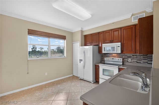 6816 STERLING GREENS PL 303, Naples, FL 34104