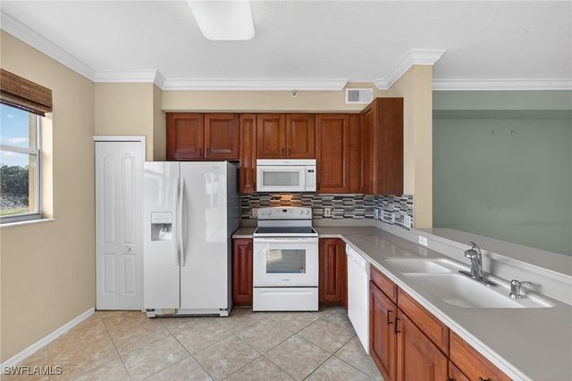 6816 STERLING GREENS PL 303, Naples, FL 34104