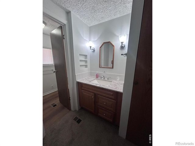 114 Linden Drive, Log Lane Village, CO 80705