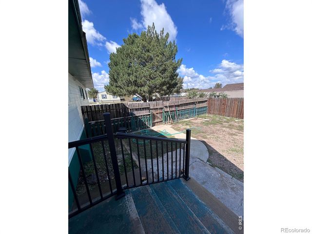 114 Linden Drive, Log Lane Village, CO 80705