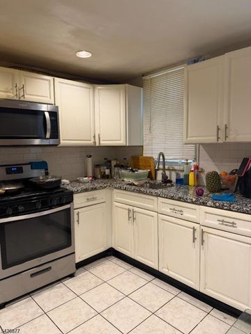 28 Burgess Pl, Passaic City, NJ 07055