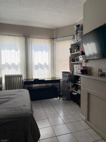 28 Burgess Pl, Passaic City, NJ 07055