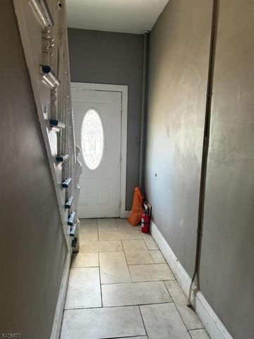 28 Burgess Pl, Passaic City, NJ 07055