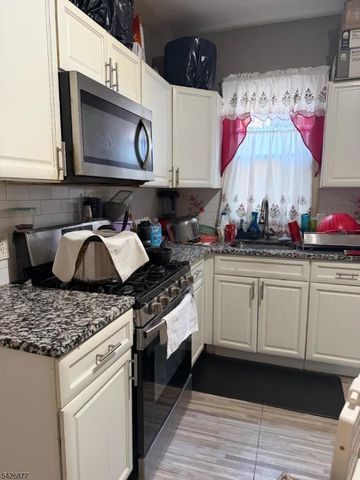 28 Burgess Pl, Passaic City, NJ 07055