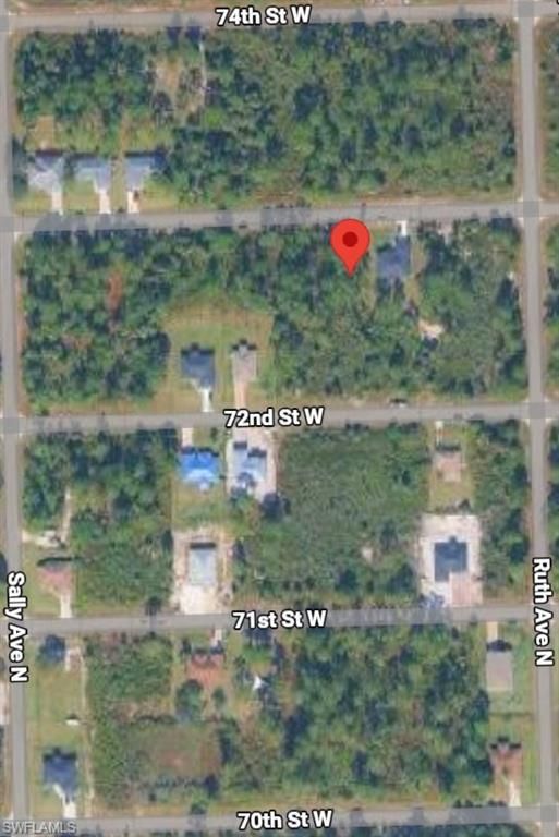 3307 63rd ST W, LEHIGH ACRES, FL 33971 — photo 2