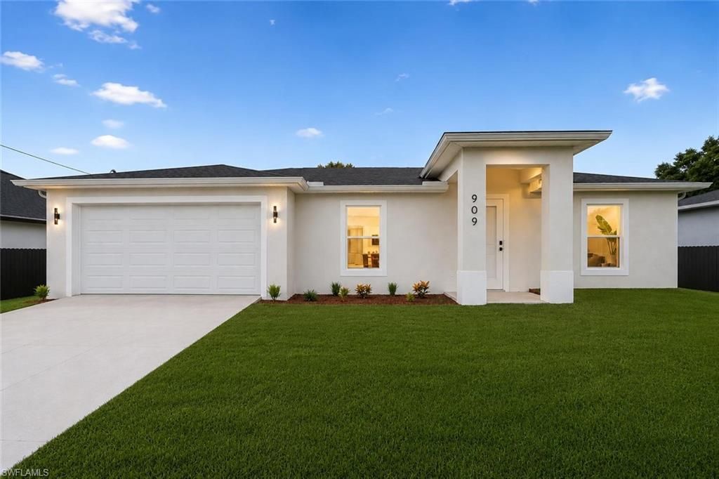 909 Grant BLVD, LEHIGH ACRES, FL 33974 — exterior