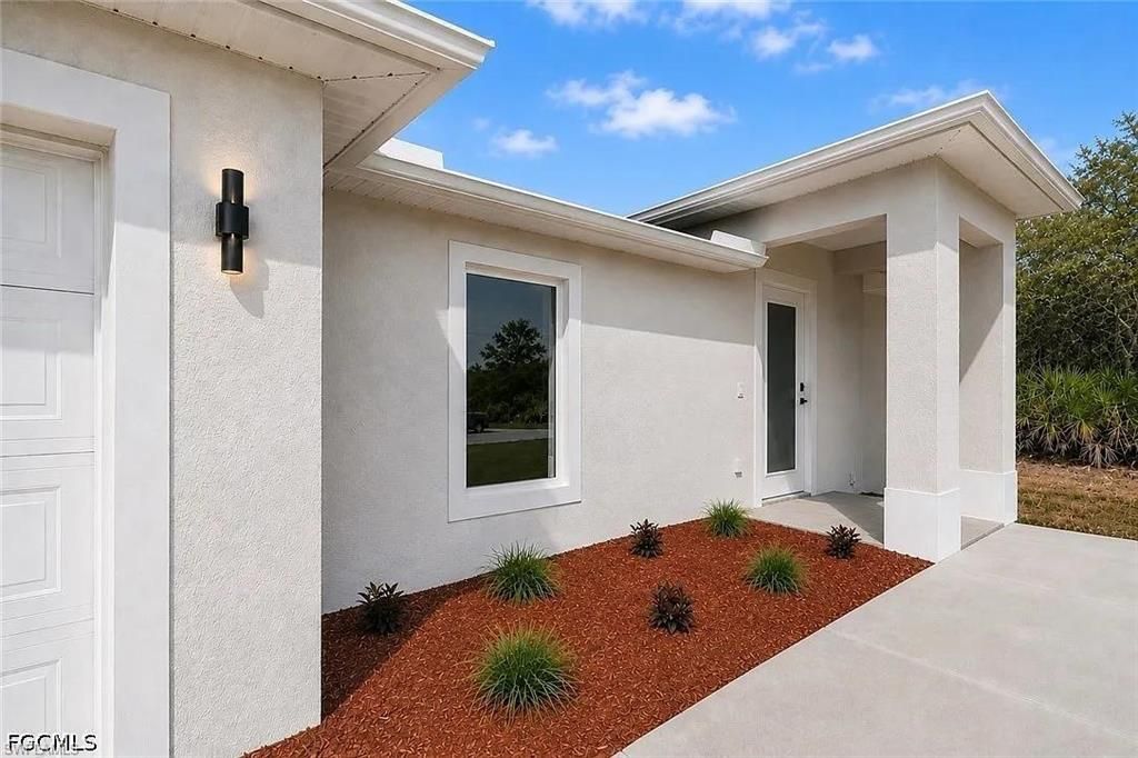 909 Grant BLVD, LEHIGH ACRES, FL 33974 — photo 2