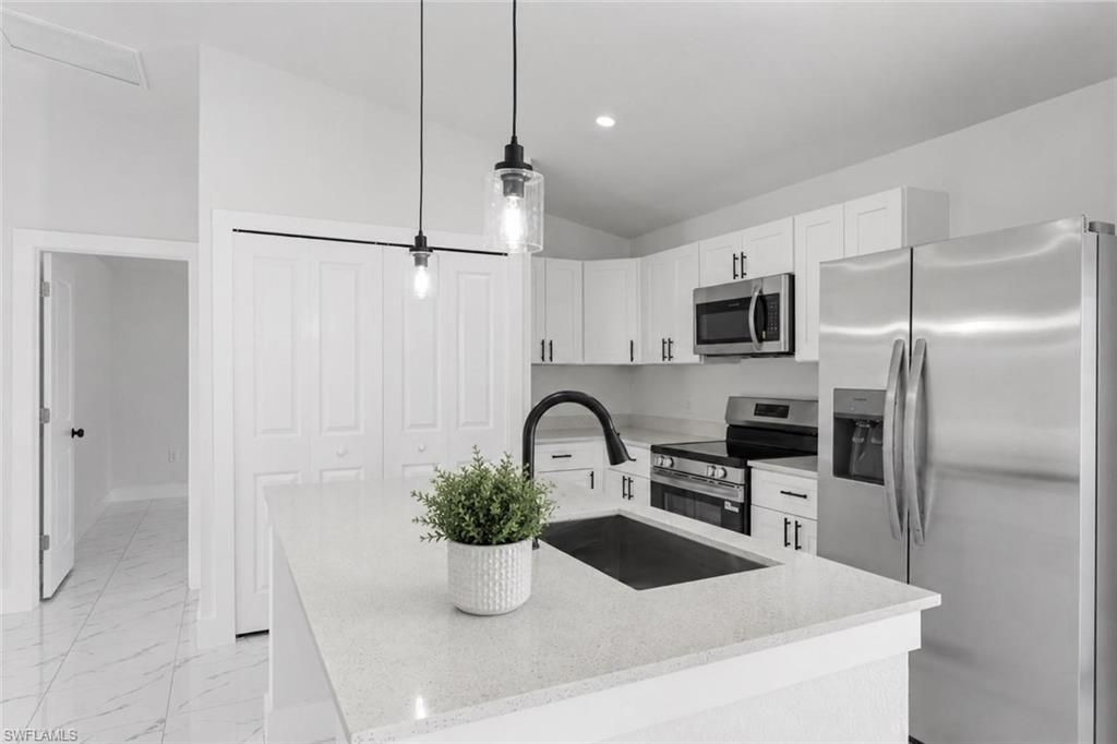 909 Grant BLVD, LEHIGH ACRES, FL 33974 — photo 3