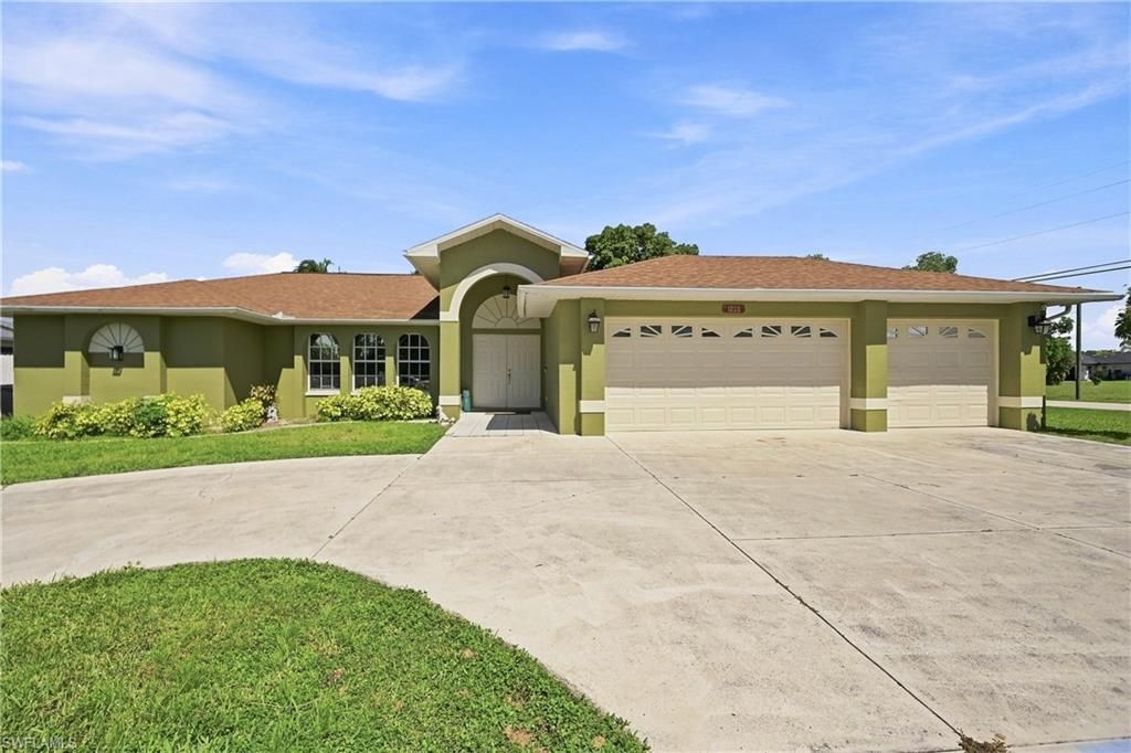 1239 SE 23rd AVE, CAPE CORAL, FL 33990 — exterior