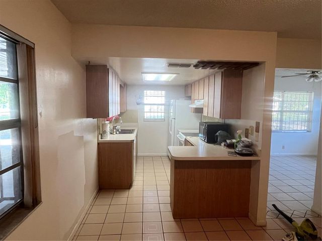7401 N ALBANY AVENUE, Tampa, FL 33604