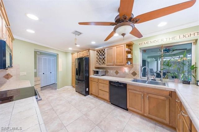 208 Baltusrol DR, Naples, FL 34113