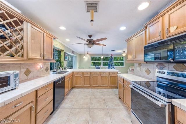 208 Baltusrol DR, Naples, FL 34113