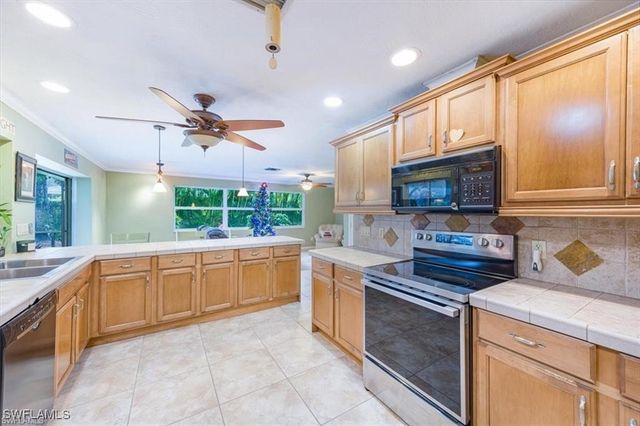 208 Baltusrol DR, Naples, FL 34113