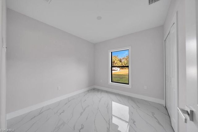 644 Woodcrest DR, Lehigh Acres, FL 33972