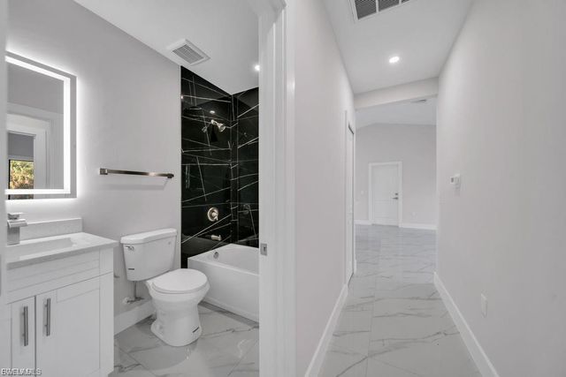 644 Woodcrest DR, Lehigh Acres, FL 33972