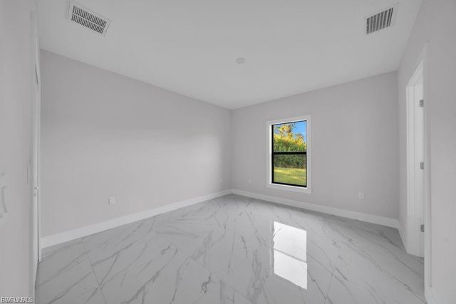 644 Woodcrest DR, Lehigh Acres, FL 33972