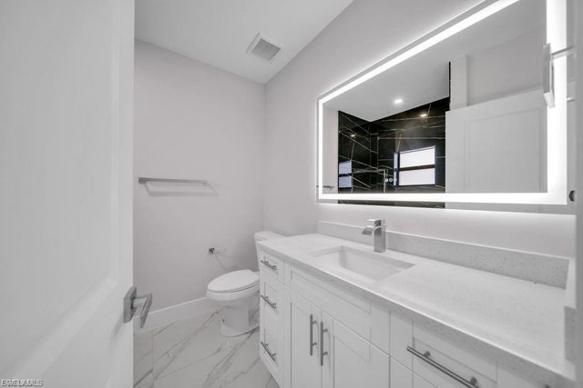 644 Woodcrest DR, Lehigh Acres, FL 33972