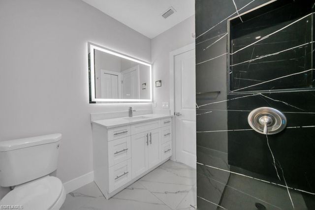 644 Woodcrest DR, Lehigh Acres, FL 33972