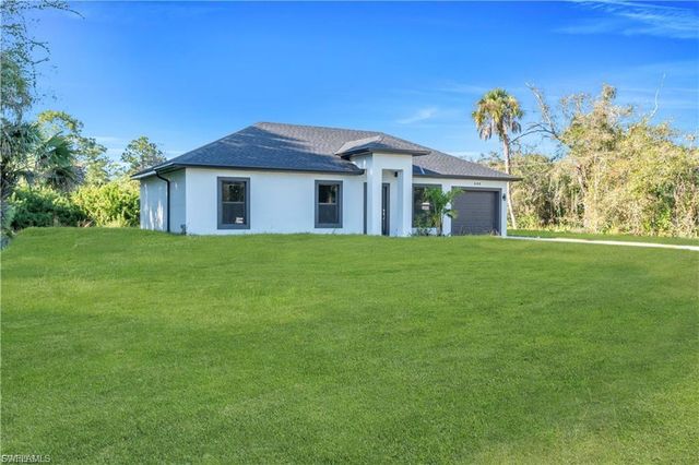 644 Woodcrest DR, Lehigh Acres, FL 33972