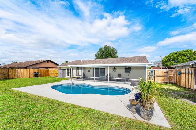 144 Cordoba Circle, Royal Palm Beach, FL 33411